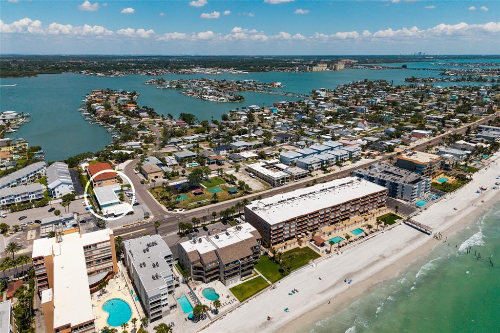 10 164th Avenue, Unit 1 Redington Beach, FL 33708 - Photo 37 of 38 an aerial view of a city with ocean view