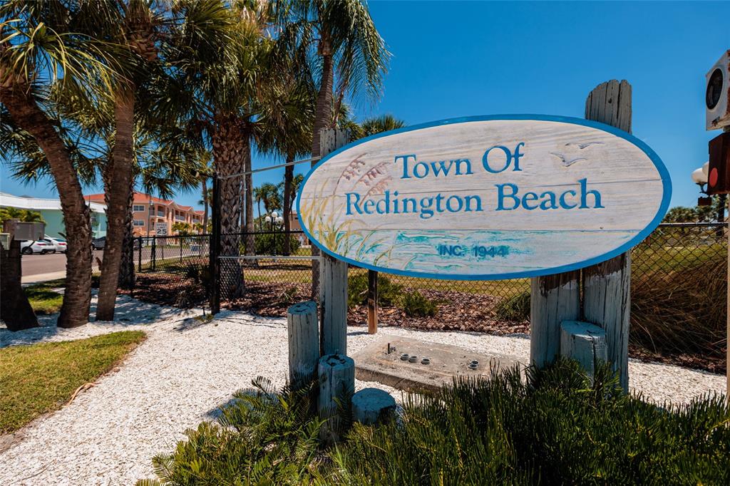 10 164th Avenue, Unit 1 Redington Beach, FL 33708 - Photo 7 of 38 a view of a park with a tree