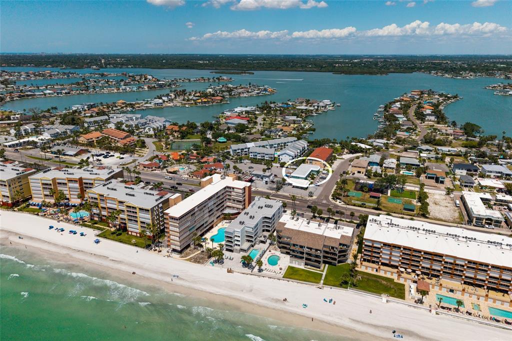10 164th Avenue, Unit 1 Redington Beach, FL 33708 - Photo 8 of 38 an aerial view of a city with houses