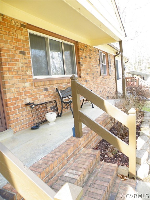 9918 Qualla Road Chesterfield, VA 23832 - Photo 3 of 49 a view of a balcony with chairs