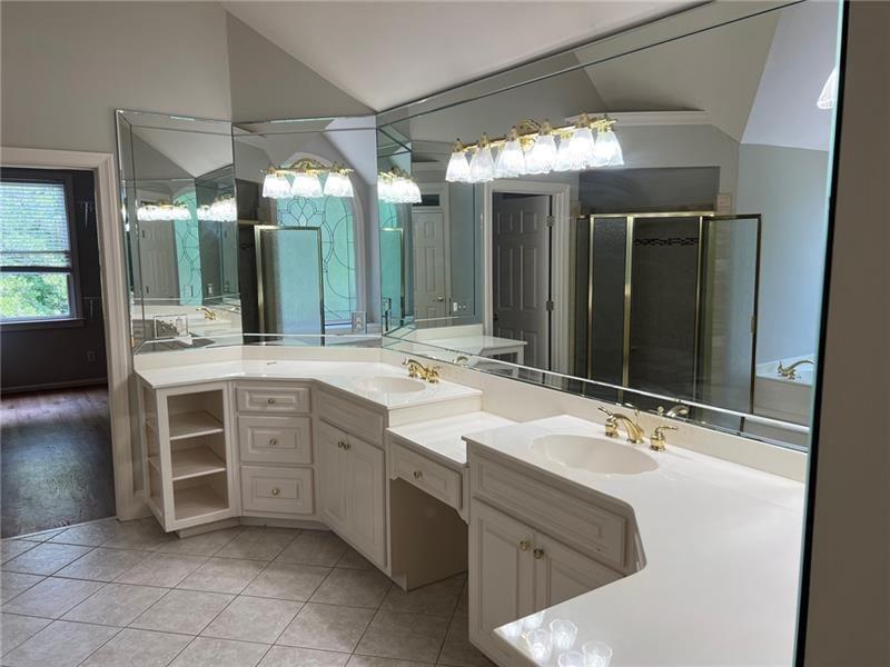 2728 Chieftain Run Duluth, GA 30097 - Photo 11 of 17 a bathroom with a double vanity sink mirror and double