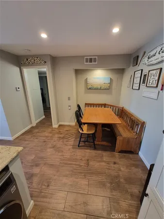 a bed room with a bed and a mirror