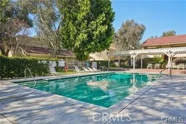 a room with gym equipment and a large window