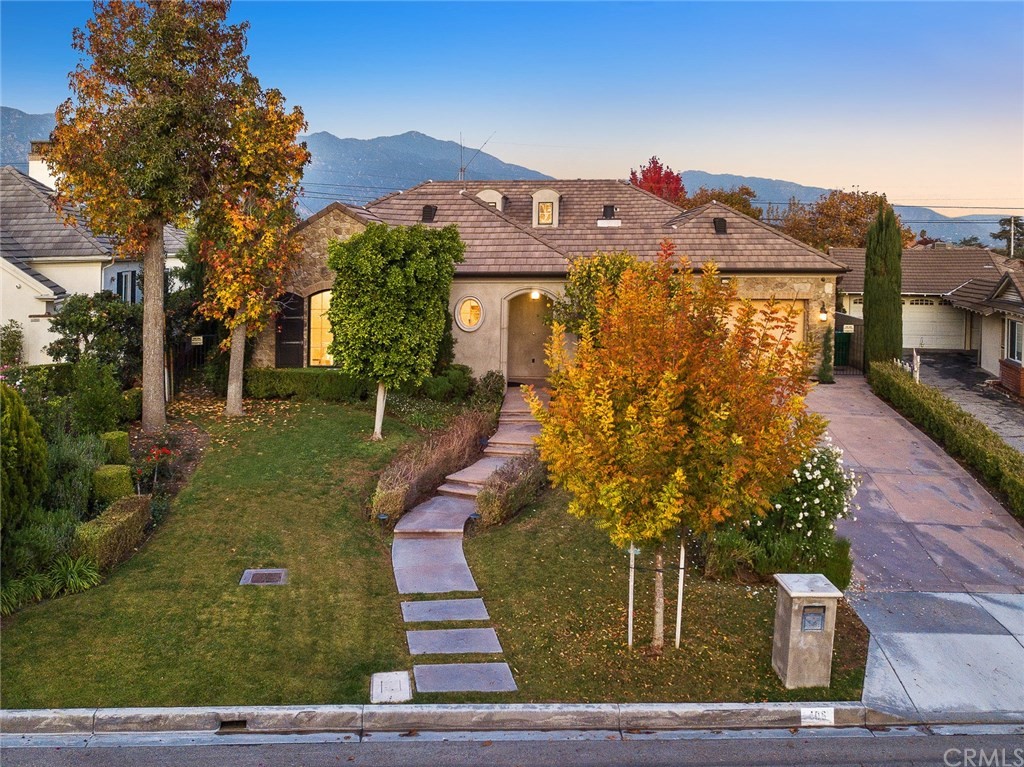 406 Drake Road Arcadia, CA 91007 - Photo 7 of 8 a front view of a house with garden