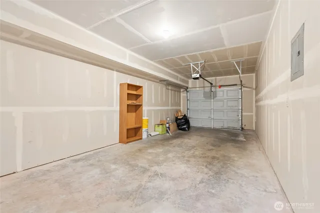 an empty room with storage and utility