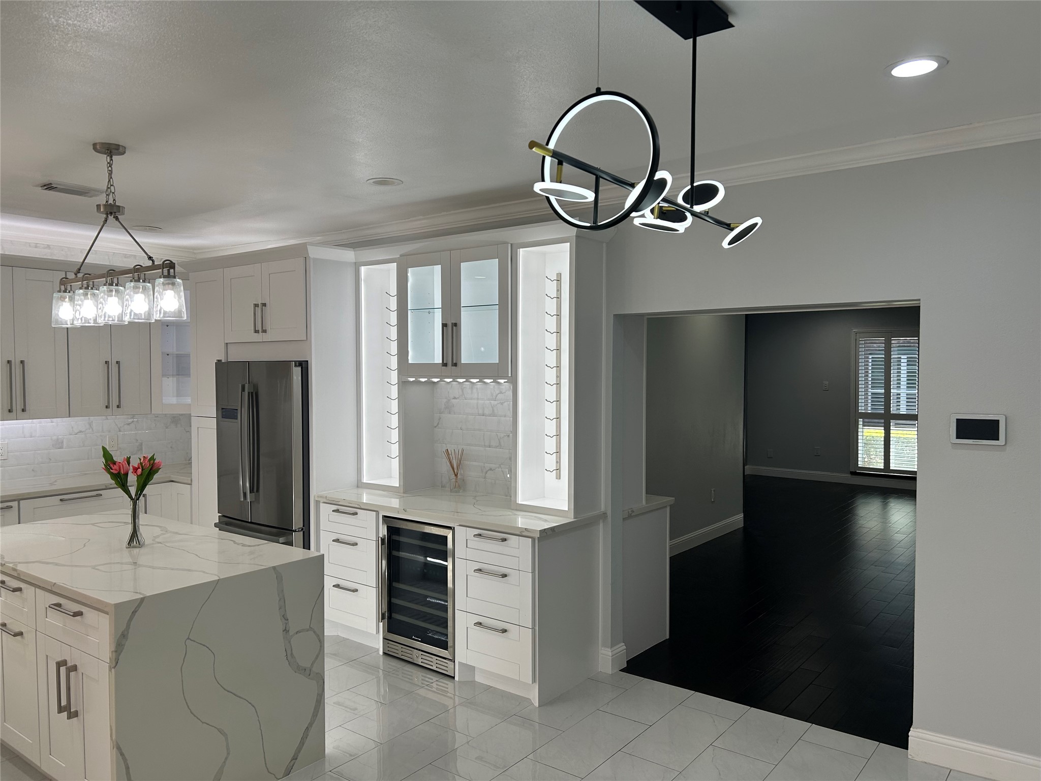 840 Threadneedle Street, Unit 220 Houston, TX 77079 - Photo 5 of 20 Enjoy a beautiful view of the kitchen featuring quartz countertops and plenty of bright lighting. Features soft-close drawers throughout.