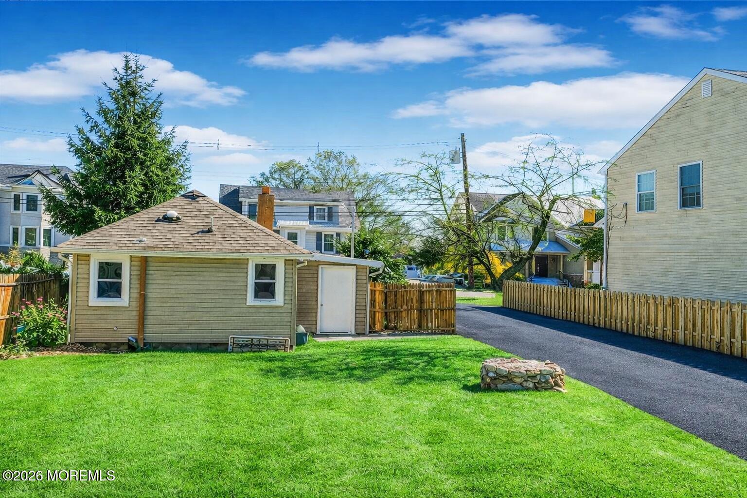 244 Overbrook Avenue Oakhurst, NJ 07755 - Photo 3 of 8 a front view of house with yard and green space