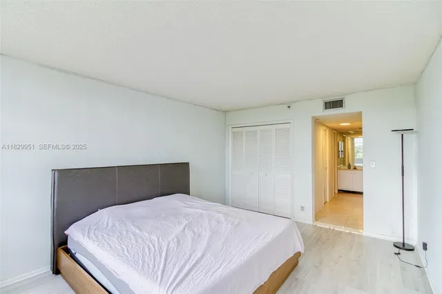 a bathroom with a sink double vanity and a mirror