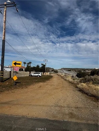 a view of car parked on the road
