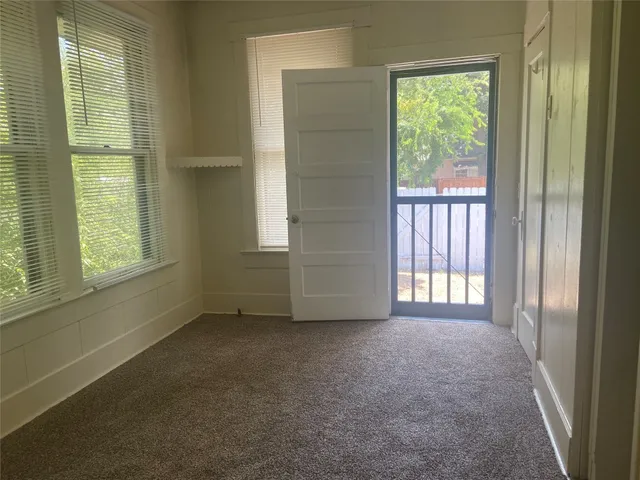 an empty room with a window