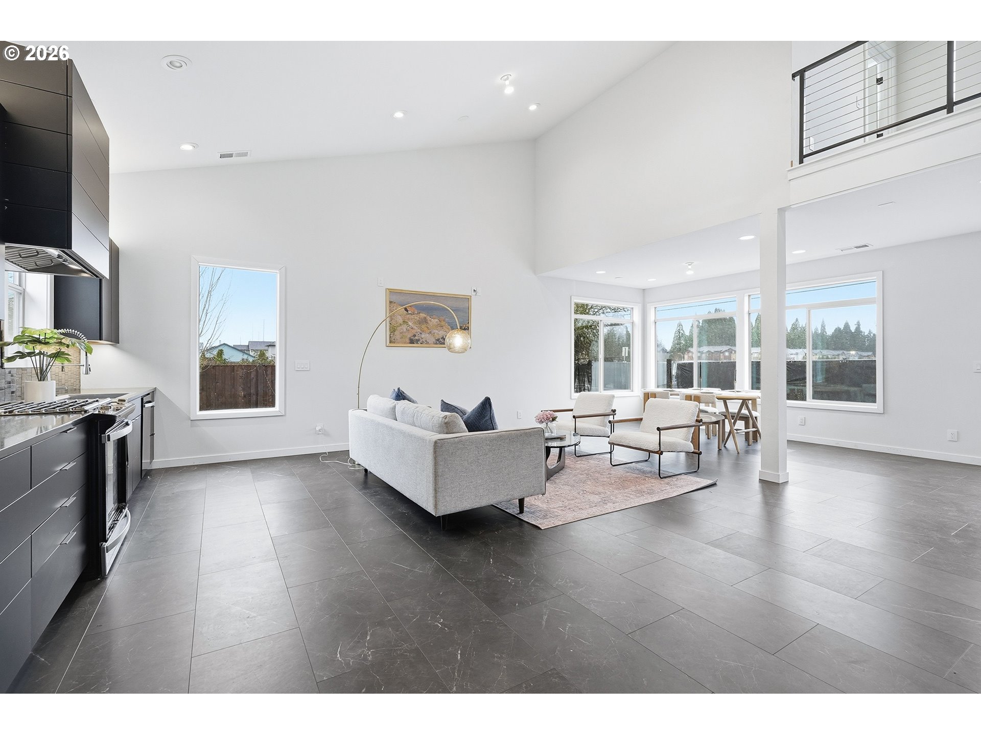 21280 Southwest Baseline Road Beaverton, OR 97003 - Photo 11 of 45 a living room with fireplace furniture and a flat screen tv