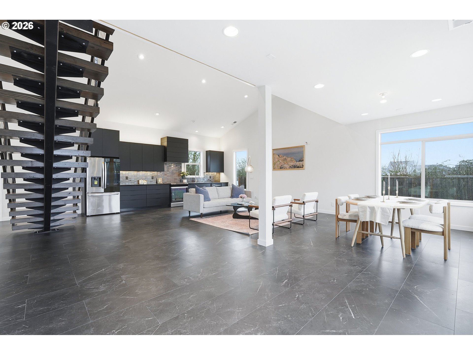 21280 Southwest Baseline Road Beaverton, OR 97003 - Photo 3 of 45 a living room with furniture and a table