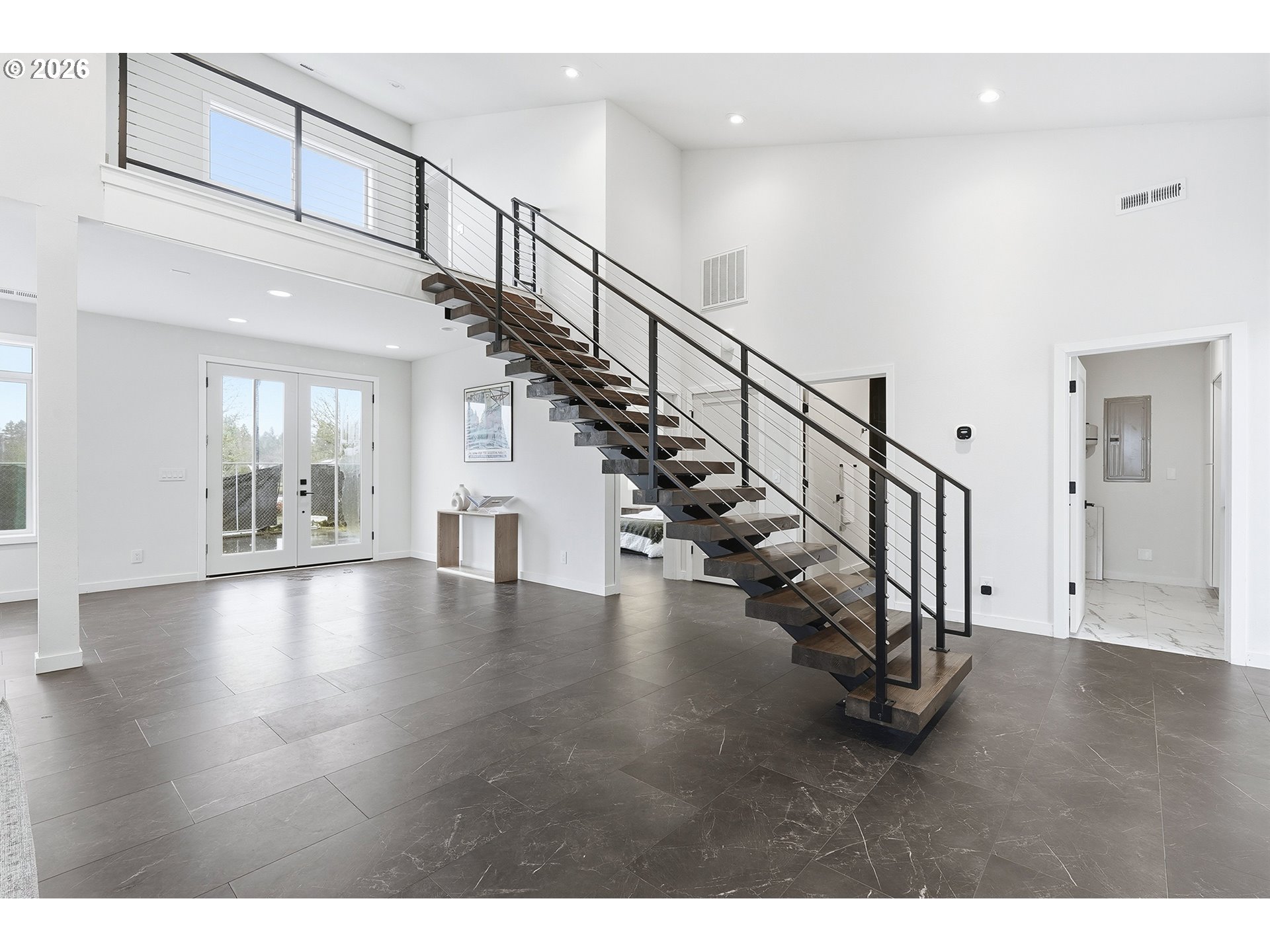 21280 Southwest Baseline Road Beaverton, OR 97003 - Photo 4 of 45 a view of an entryway with wooden floor