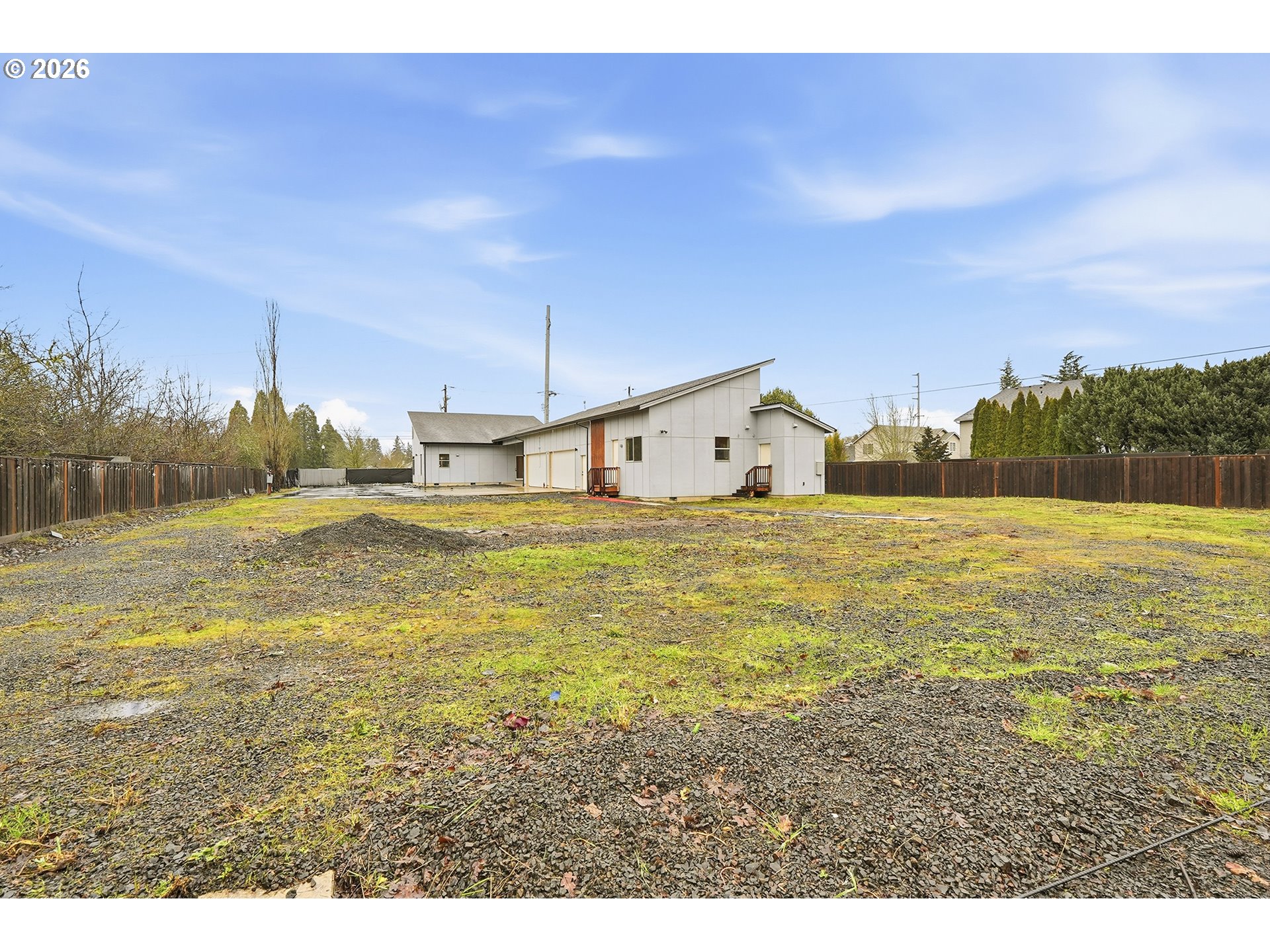21280 Southwest Baseline Road Beaverton, OR 97003 - Photo 44 of 45 a large pool that has lawn chairs with wooden floor