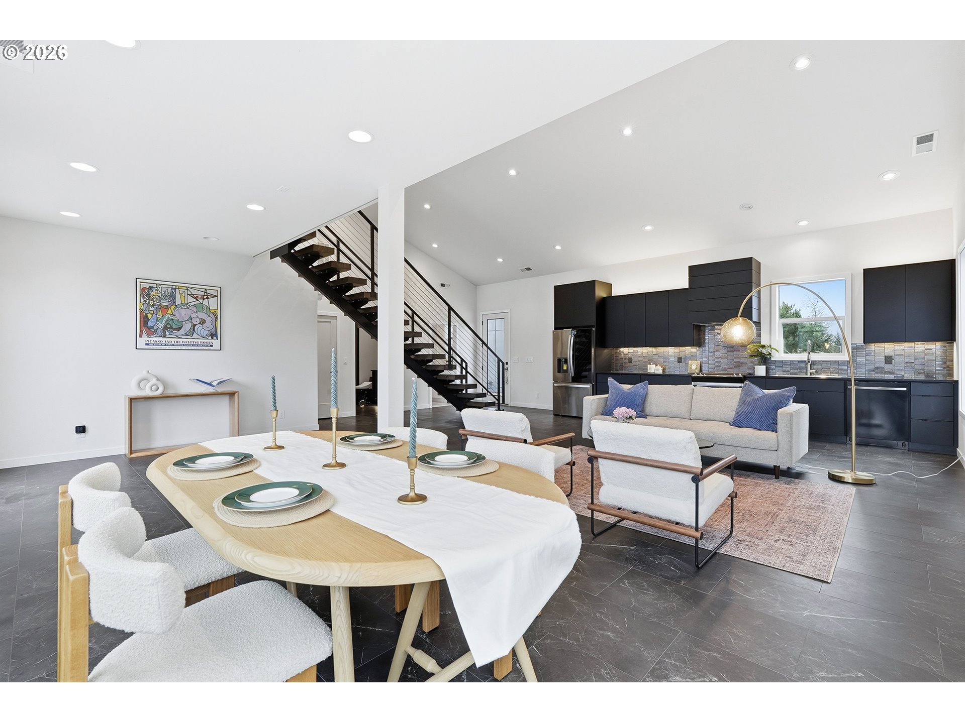 21280 Southwest Baseline Road Beaverton, OR 97003 - Photo 7 of 45 a living room with kitchen island furniture and a wooden floor