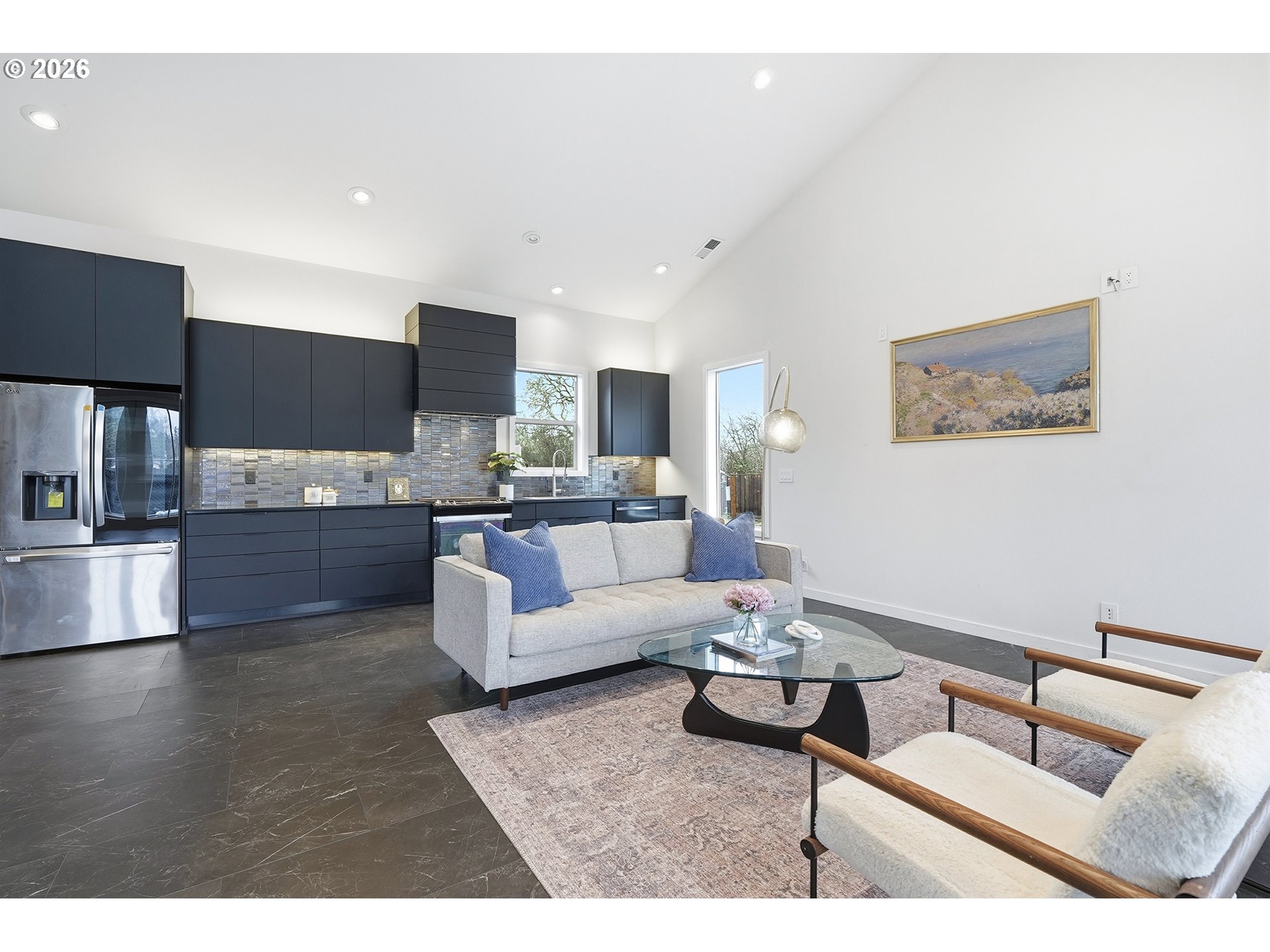 21280 Southwest Baseline Road Beaverton, OR 97003 - Photo 8 of 45 a living room with furniture and kitchen view