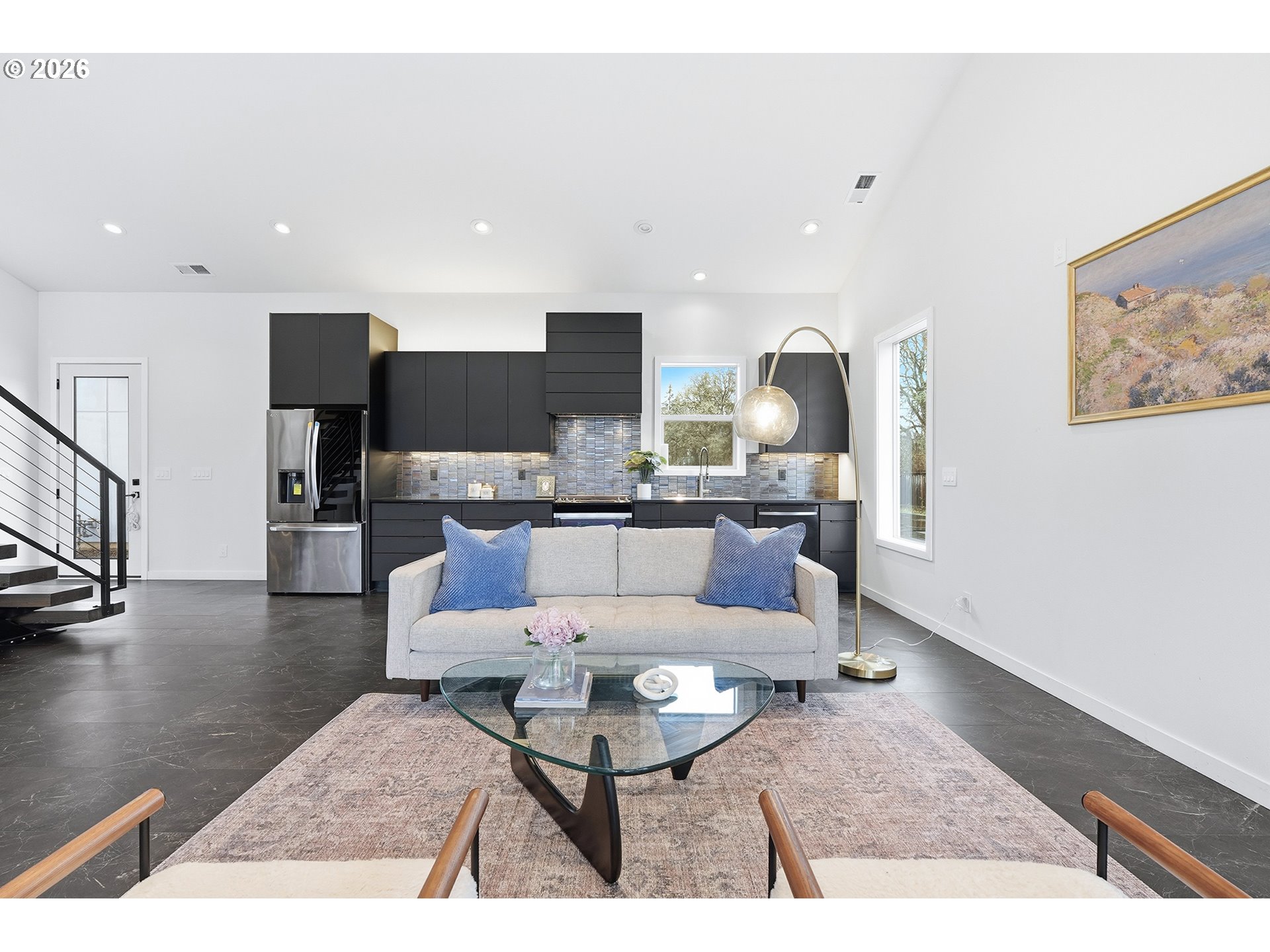 21280 Southwest Baseline Road Beaverton, OR 97003 - Photo 9 of 45 a living room with furniture and kitchen view