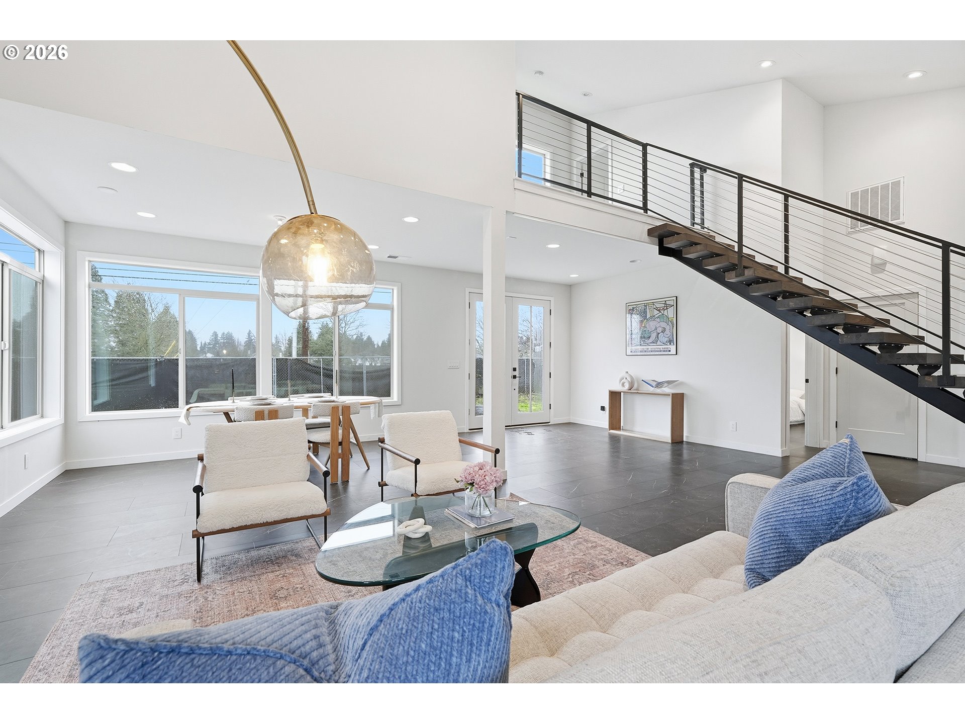 21280 Southwest Baseline Road Beaverton, OR 97003 - Photo 10 of 45 a living room with furniture and a large window
