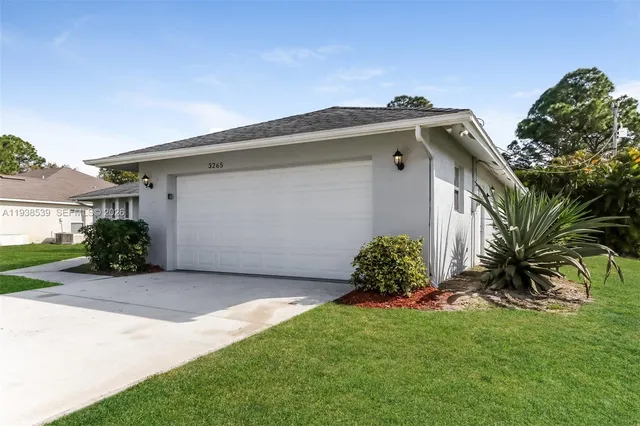 $1,990 | 3265 Southwest Escarole Street, Port St. Lucie, FL 34953