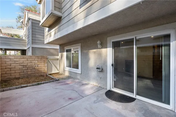 a view of a glass door of the house