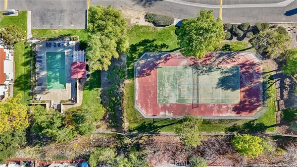 an aerial view of a house with swimming pool