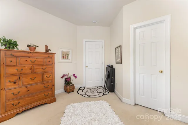 a view of a hallway with closet