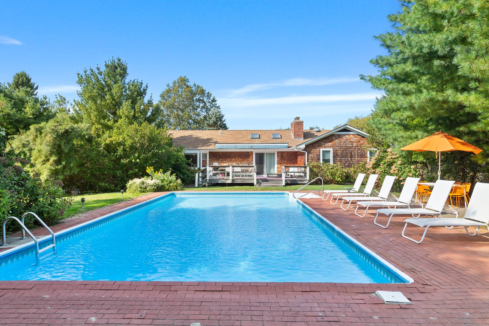 30 Lower 7 Ponds Road Water Mill, NY 11976 - Photo 30 of 32 a view of a house with pool