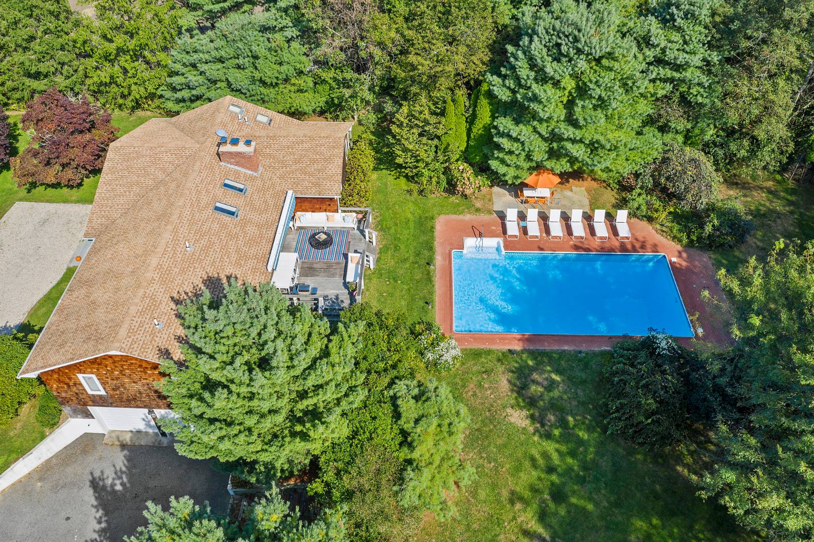 30 Lower 7 Ponds Road Water Mill, NY 11976 - Photo 8 of 32 an aerial view of a house with a yard