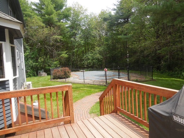 294 Rangeway Road Billerica, MA 01862 - Photo 25 of 28 a view of balcony with deck and trees