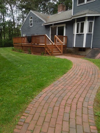 294 Rangeway Road Billerica, MA 01862 - Photo 27 of 28 a front view of a house with garden