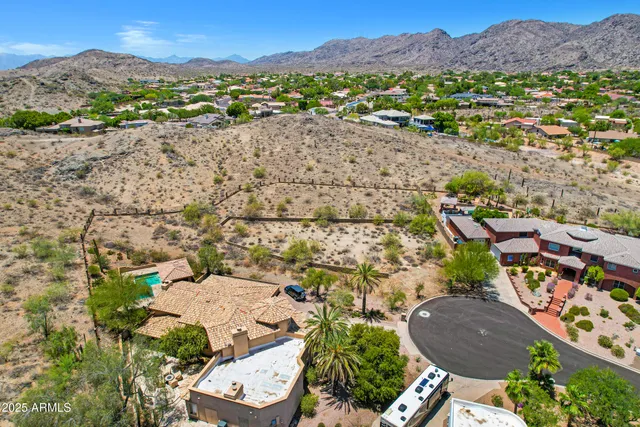 an aerial view of residential house with outdoor space