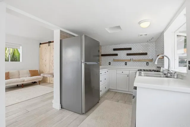 a room with a table and chairs