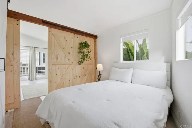 a front view of a house with washer and dryer