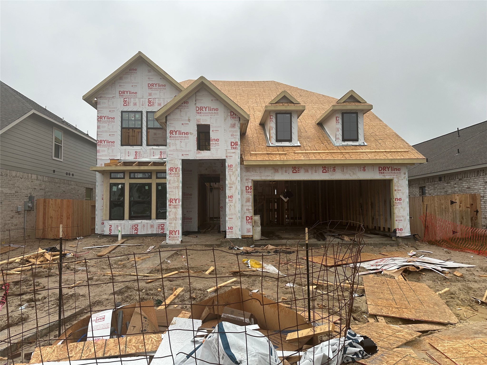 3228 Bright Maple Drive Conroe, TX 77385 - Photo 2 of 22 a view of a white house with yard and furniture