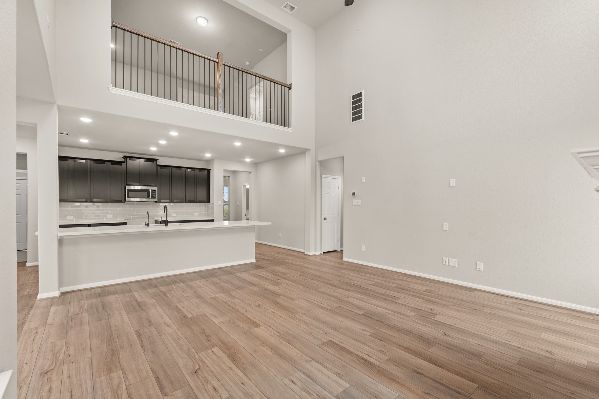 3228 Bright Maple Drive Conroe, TX 77385 - Photo 6 of 22 a view of large kitchen with stainless steel appliances cabinets