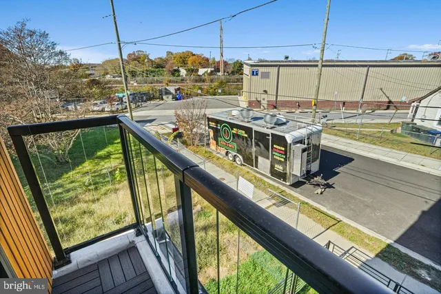 a view of a balcony with chairs