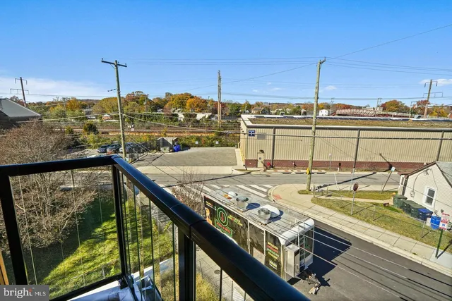 a view of a balcony with chairs