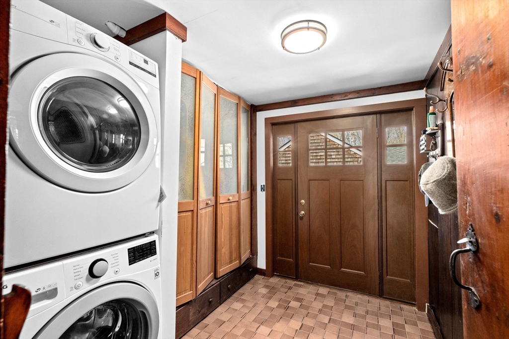 385 Whiting Street Hanover, MA 02339 - Photo 22 of 42 a view of a hallway with washer and dryer
