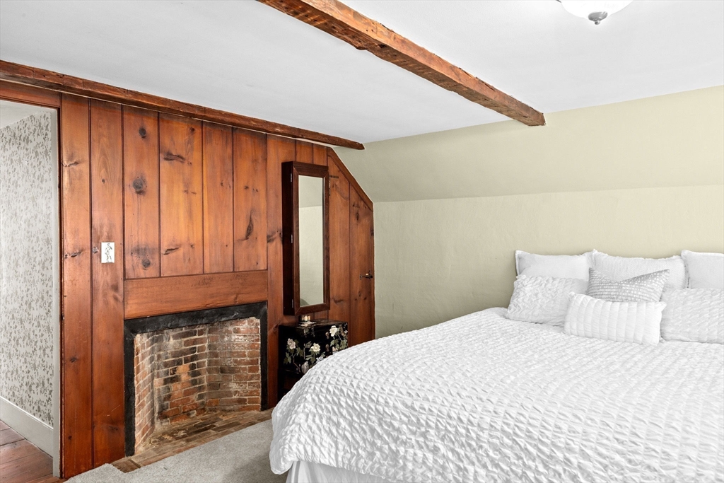 385 Whiting Street Hanover, MA 02339 - Photo 25 of 42 a bedroom with a bed and a window