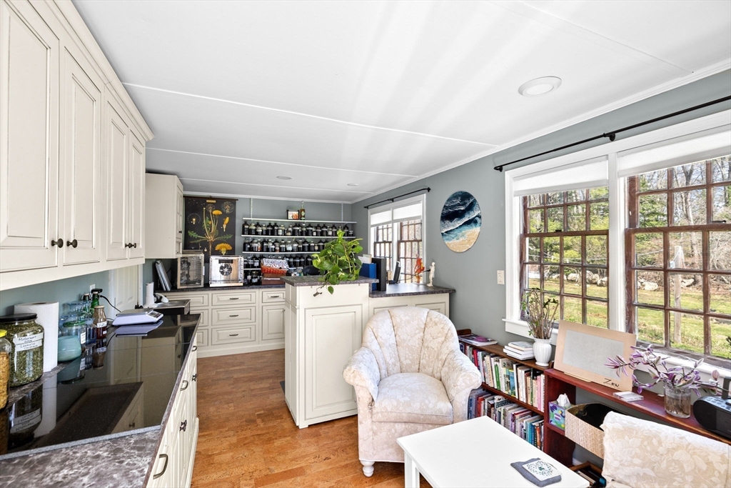 385 Whiting Street Hanover, MA 02339 - Photo 29 of 42 a living room with furniture and a window