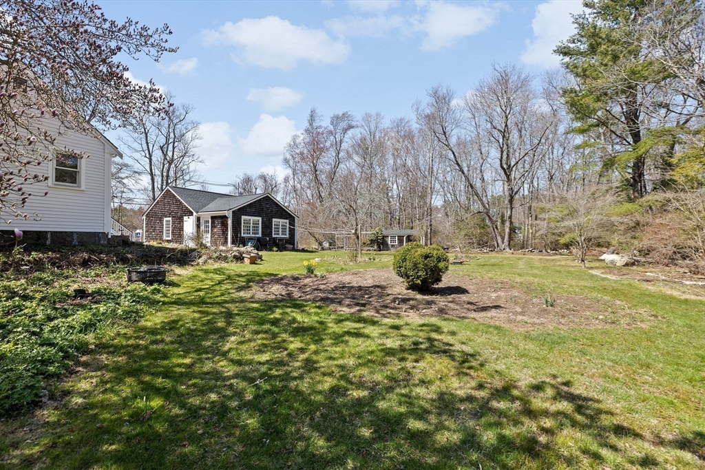 385 Whiting Street Hanover, MA 02339 - Photo 35 of 42 a view of a house with a yard