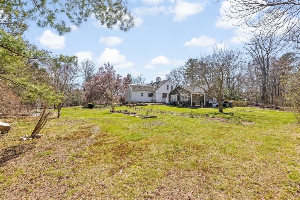 385 Whiting Street Hanover, MA 02339 - Photo 37 of 42 a view of swimming pool with an outdoor space and seating area
