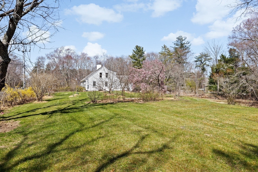 385 Whiting Street Hanover, MA 02339 - Photo 38 of 42 a view of a house with a big yard