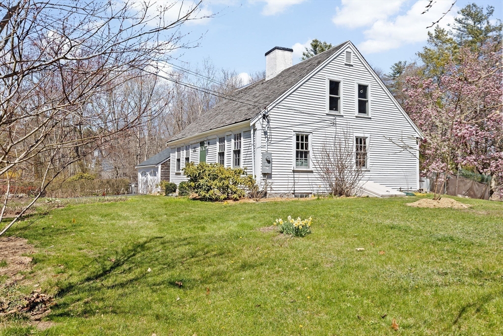385 Whiting Street Hanover, MA 02339 - Photo 39 of 42 a view of a house with a yard