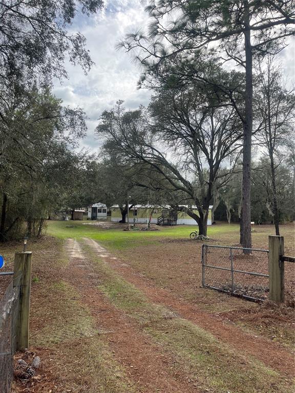10330 Northeast 90th Street Bronson, FL 32621 - Photo 3 of 28 a view of a lake view