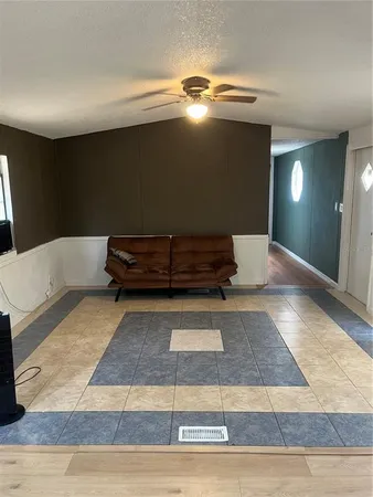 a view of a living room with furniture