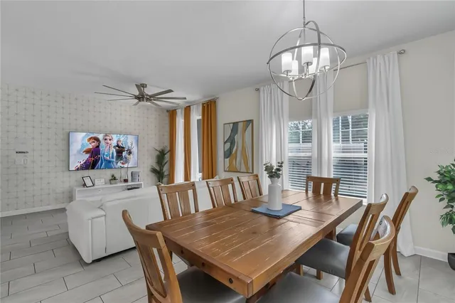 a bed room with a bed and a painting