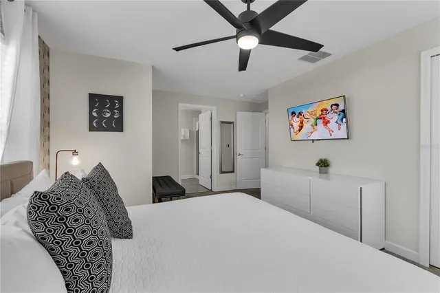 a bathroom with a double vanity sink and mirror