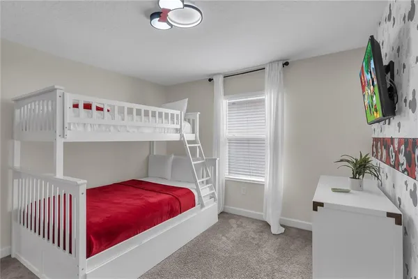 a view of a backyard with garage