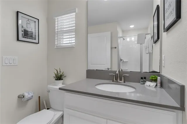 a view of a backyard with table and chairs